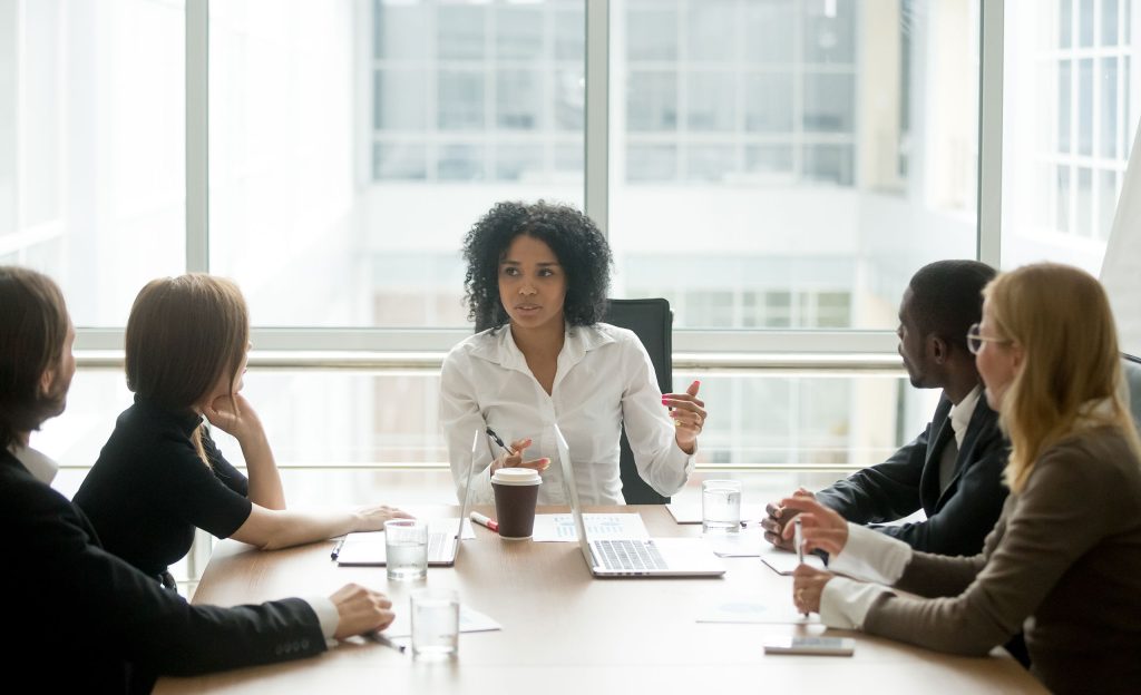 Black businesswoman leading a meeting